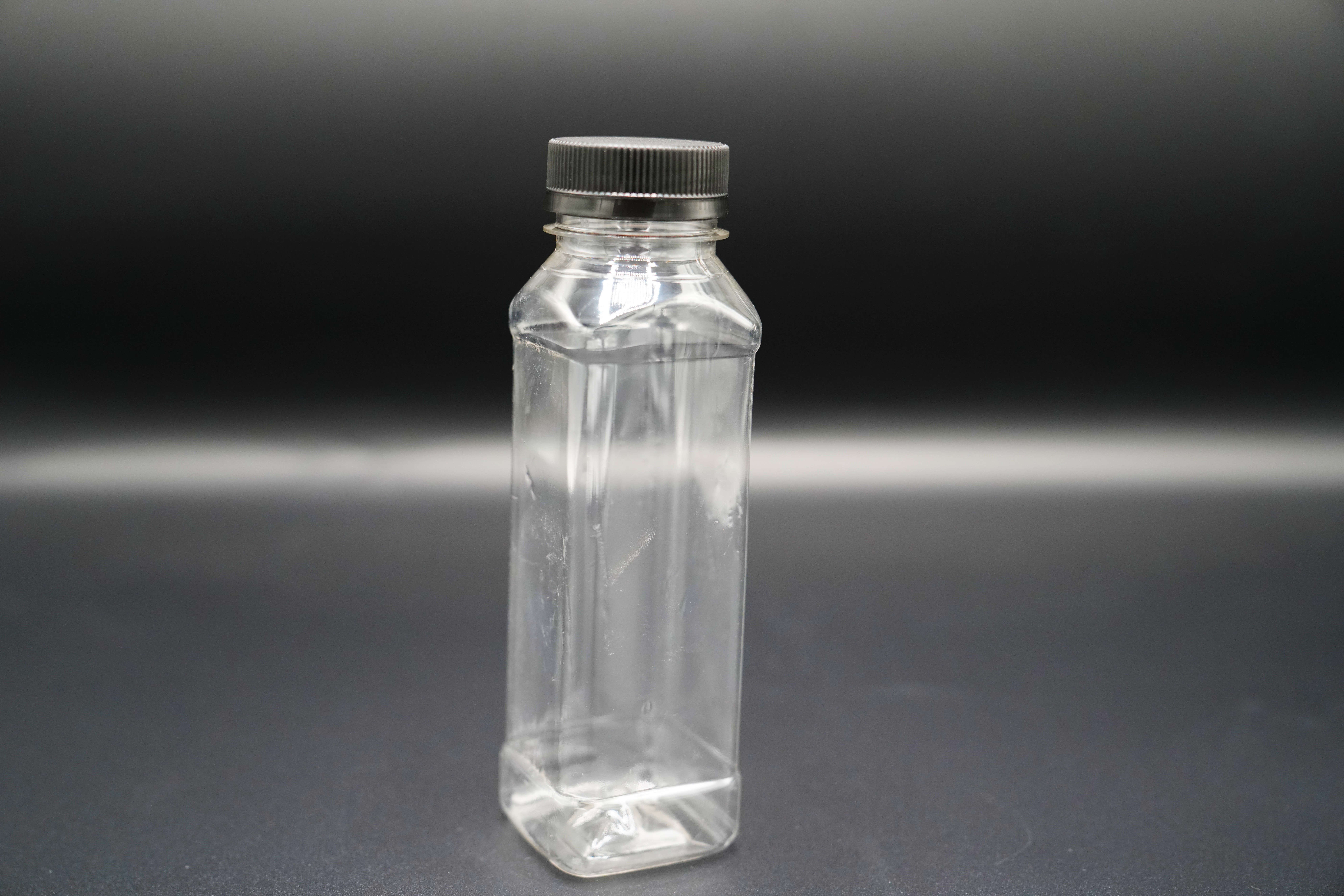 Transparent plastic bottle with a black lid, lightweight, square shape, 250 ml capacity, 26Set